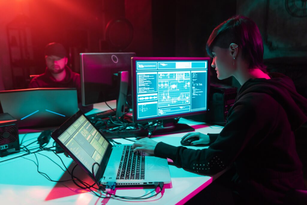 Photo of man and woman hacking computers and the internet. Pittsburgh, Pennsylvania Computer Fraud and Abuse Act (CFAA) Lawyers | CFAA | Attorneys